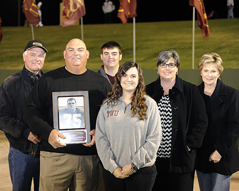 Marla Boswell and her family celebrate Scott Boswell's inducation into the MSU Texas Hall of Honor in 2013.