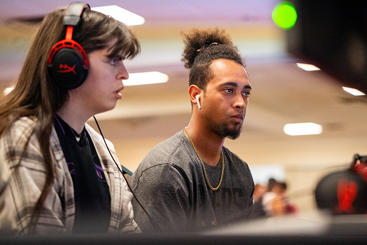 Two members focus in on their esports competition at Clark Student Center