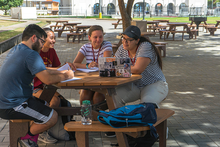 MSU Texas students relax at a table