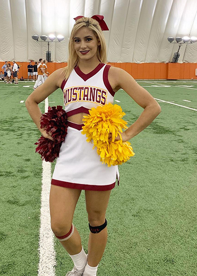 Lauren Gardner in MSU Texas cheer uniform