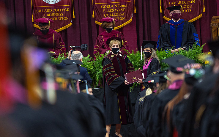 Dr. Suzanne Shipley greets Spring 2021 graduates