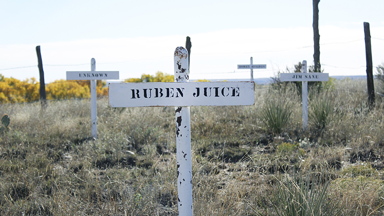 Boothill Cemetery in Old Tascosa by Morgan Page. Inhabitants of Boothill Cemetery had to die with boots on to be buried there. 