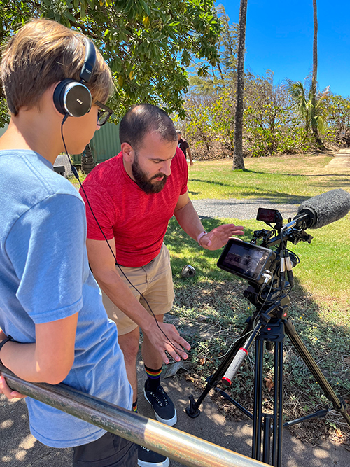 Jonathon Quam, associate professor of Mass Communication, instructs a student in the finer points of camera work during his time in Maui as the recipient of the Bice Faculty Support Grant.