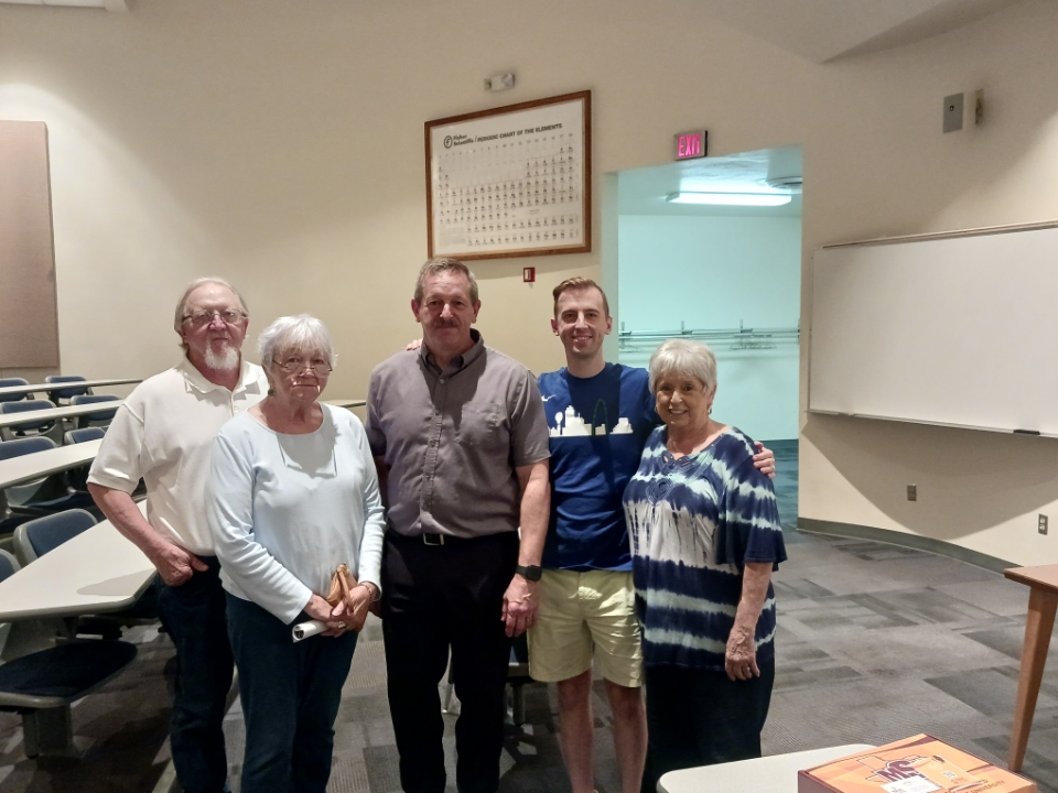 Dr. Bill Schmitz with some of his family who attended his lecture