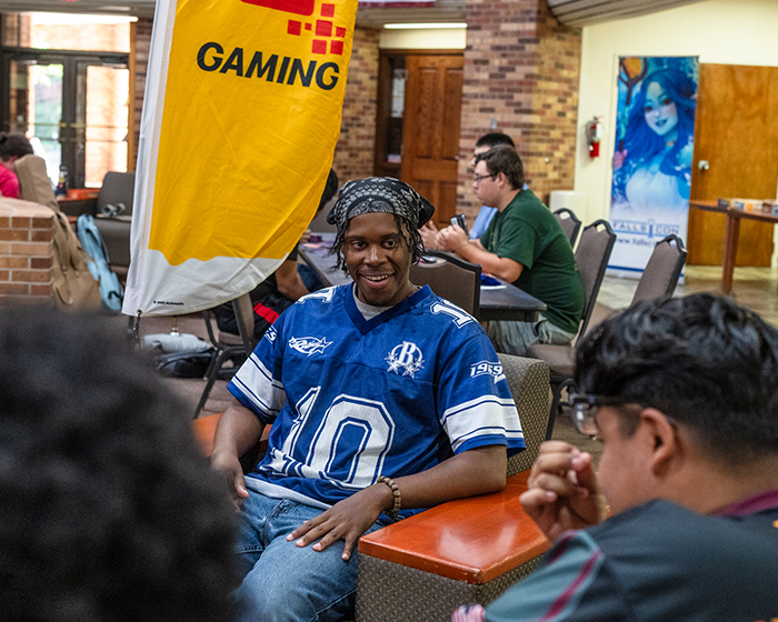 Esports competitors relax in atrium