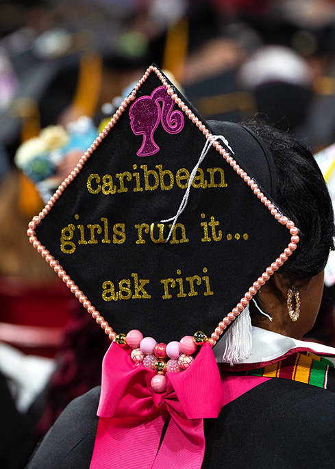 Caribbean students celebrate graduation with message "Caribbean girls run with it"