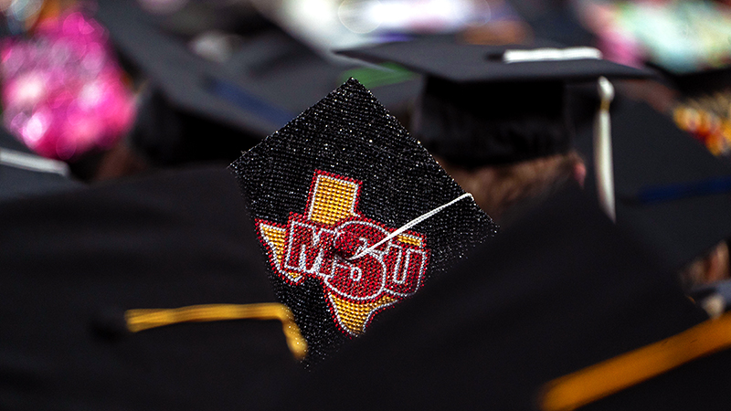 graduation cap that reads MSU