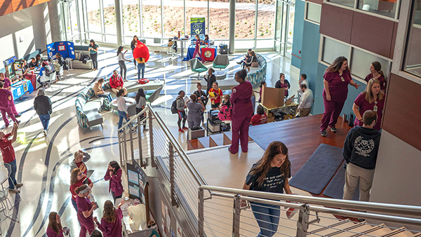 Centennial Hall showcased Health Fair back in 2021. Picture shows a busy lobby with students