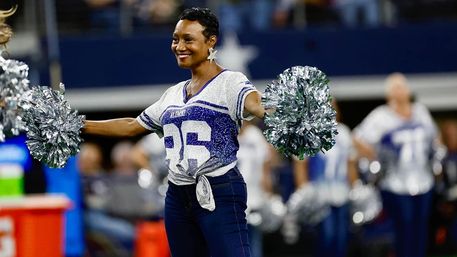 Marion Cooper Napoleon with her Cowboys cheer uniform on