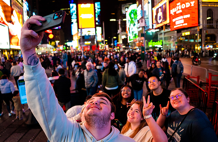 The Model UN team members pose at Times Square in New York