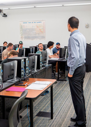 Dr. Yu Guo speaks to a class at the McCoy College of Engineering