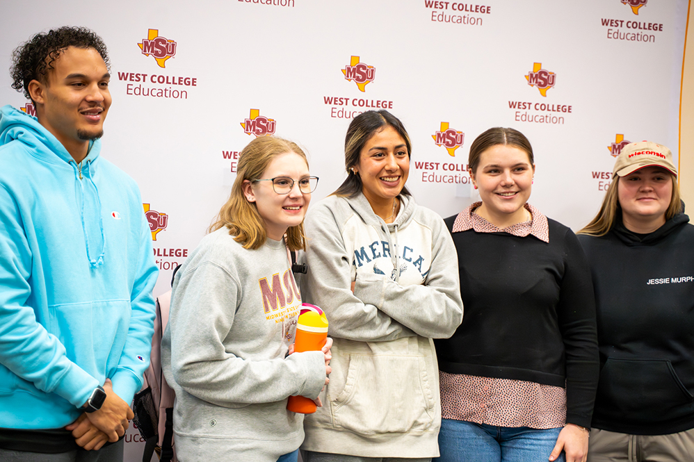 Group of students supporting Heroes In Education