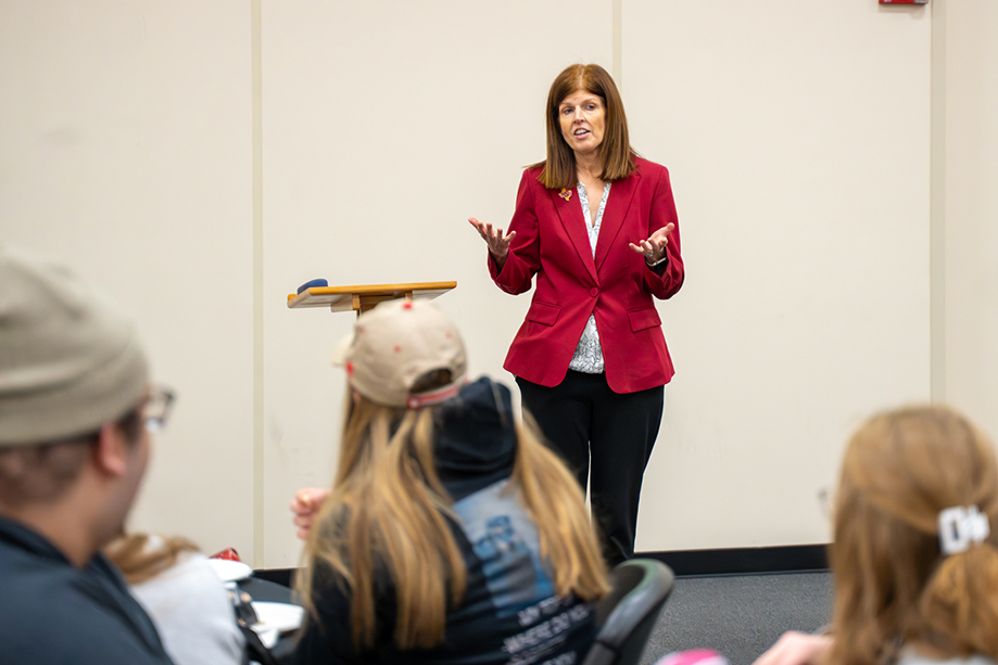 Dr. Leeann Curry, dean of West College, speaks to group