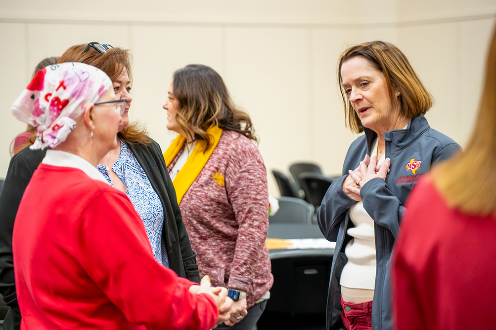 Dr. Stacia Haynie speaks with group