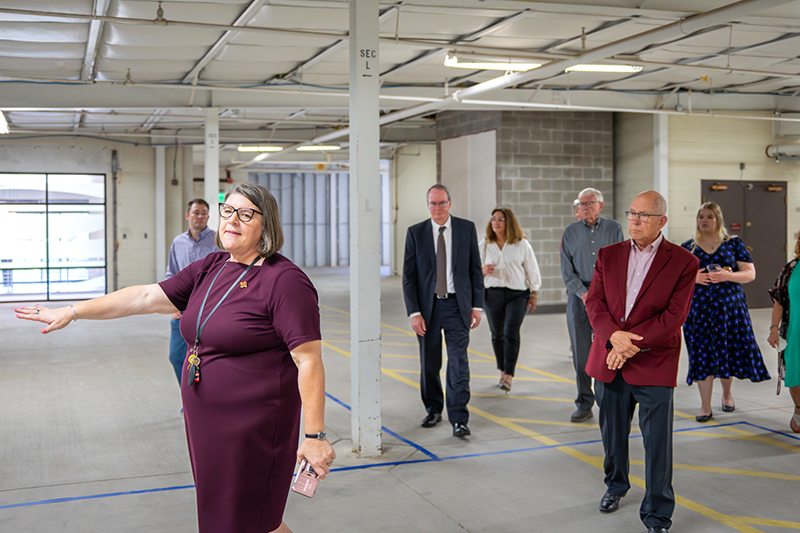 Marcy Brown Marsden gives a tour of where the Military Education Center will be