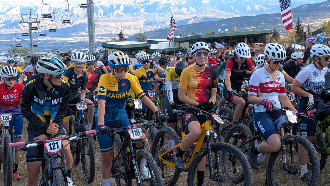 Big group photo from the 2025 Collegiate Mountain Bike National Championships held in Grand Junction, Colorado, on October 9. 