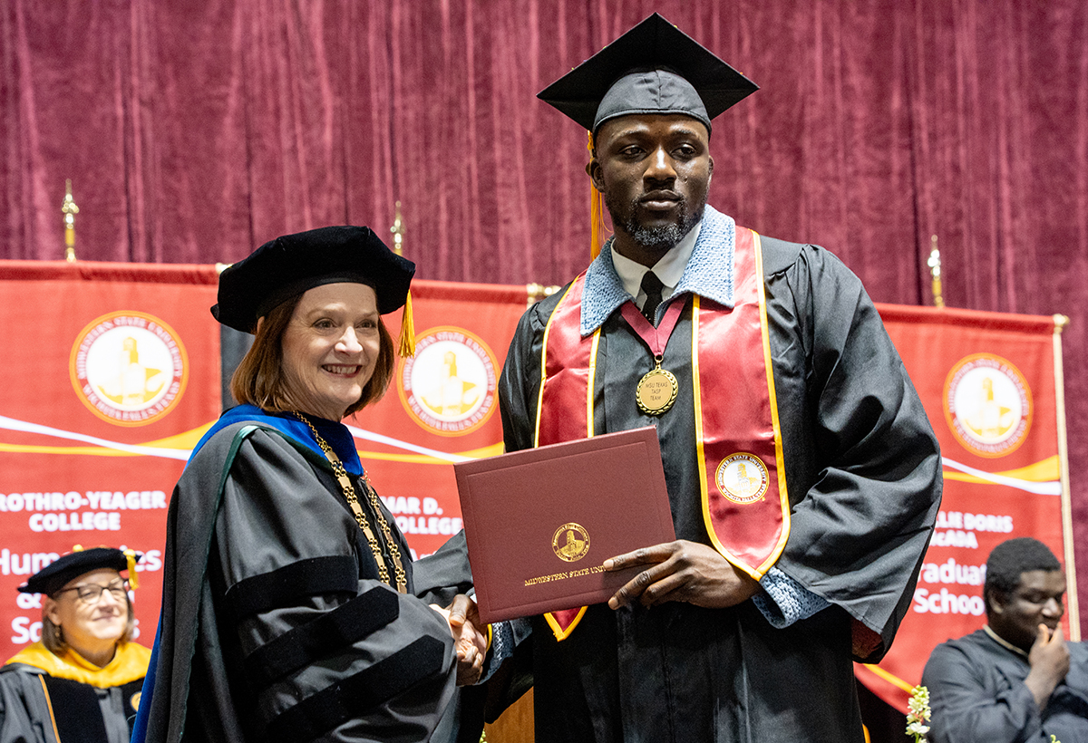 Samuel Olatunde with MSU Texas President Stacia Haynie