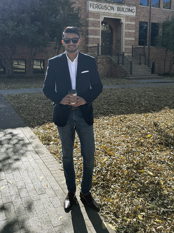 Majid stands in front of the Ferguson Building