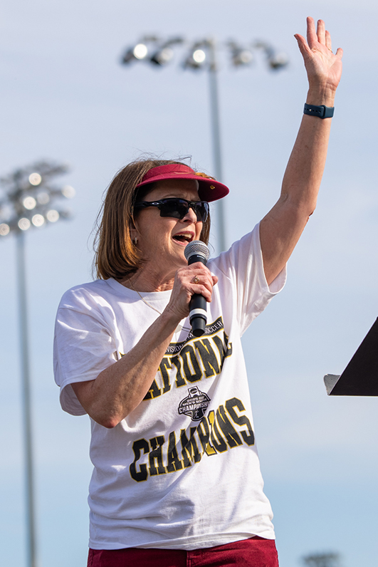 President Stacia Haynie fires up the crowd at soccer parade