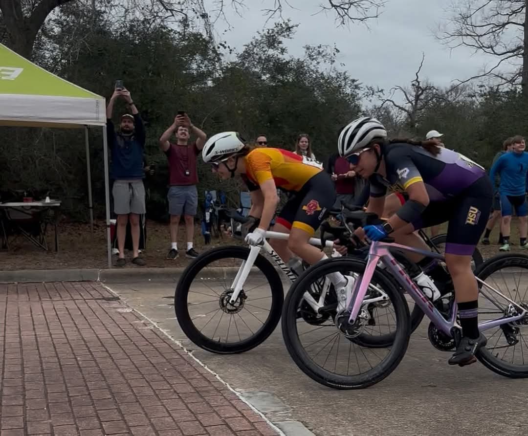 MSU Cyclist tries to pass an opponent in College Station