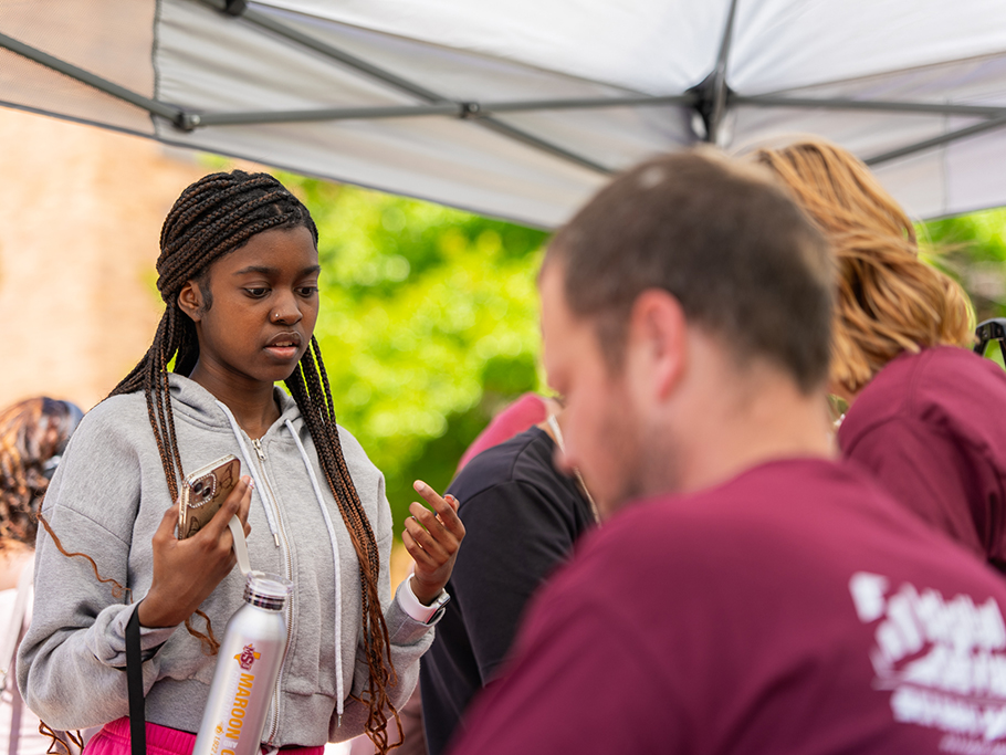 Garrett Holland greets donors on April 8 at Maroon and Gold Giving Day