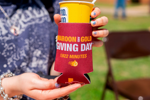 Giving Day 1922 minutes on a koozie