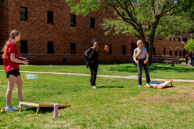 Students playing games at Maroon and Gold Giving Day