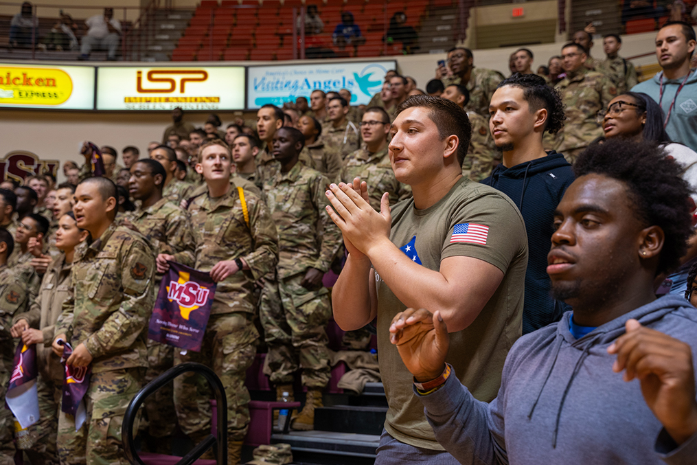 Military members supporting the MSU Mustangs in basketball