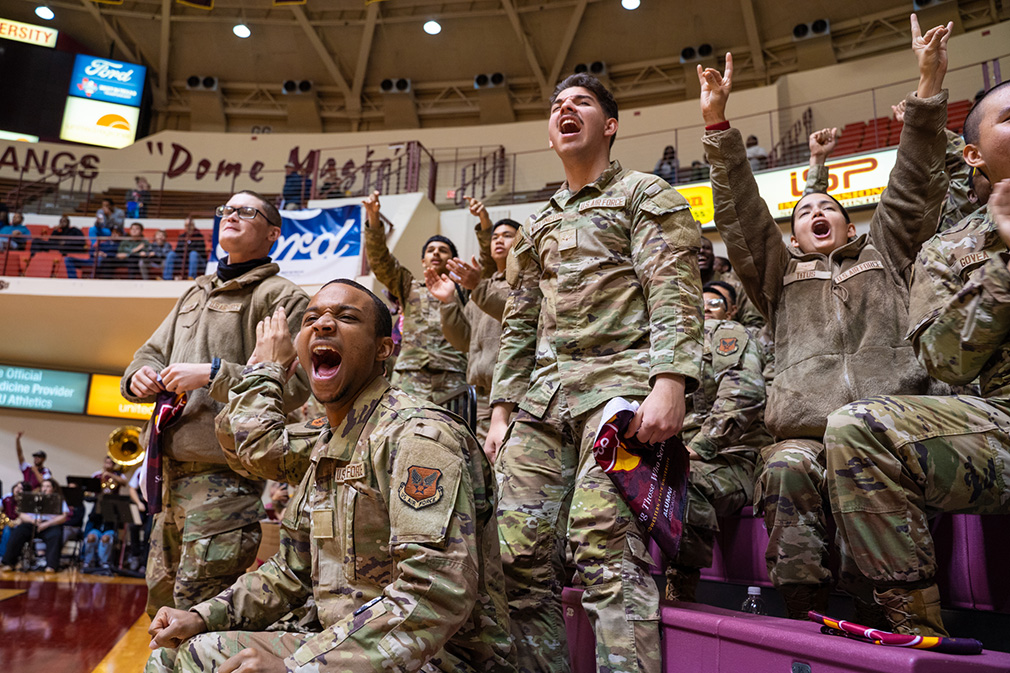 Military members having a joyful time at Military Appreciation Game at MSU Texas