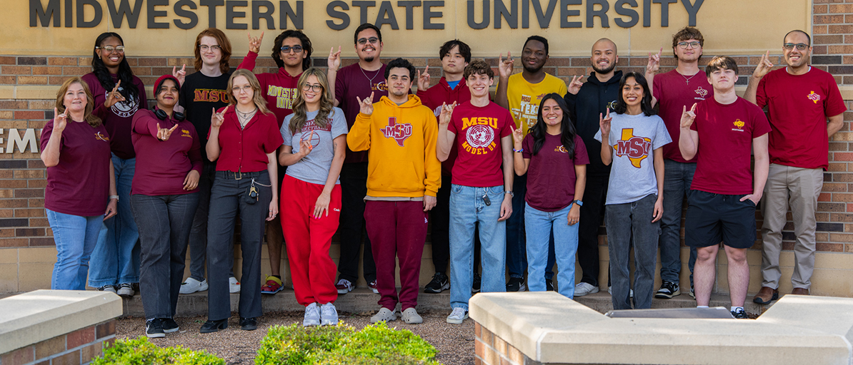 MSU Texas students on Team Selene pose before the campus sign