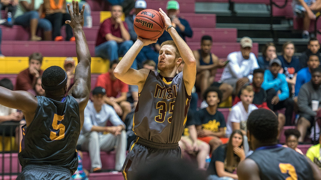 Nick Powell shooting the basketball while he was a player at Midwestern State