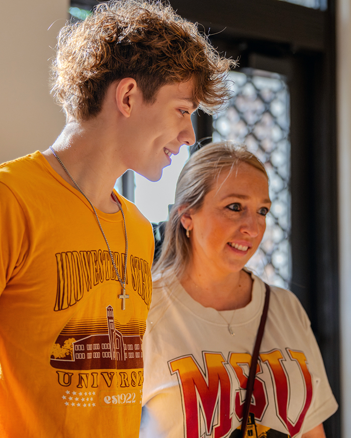 Two new students make conseravation about their campus tour