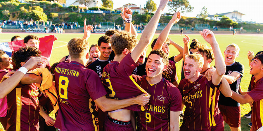 Soccer team was welcomed home Dec. 15 by cheering fans in front of D.L. Ligon Coliseum