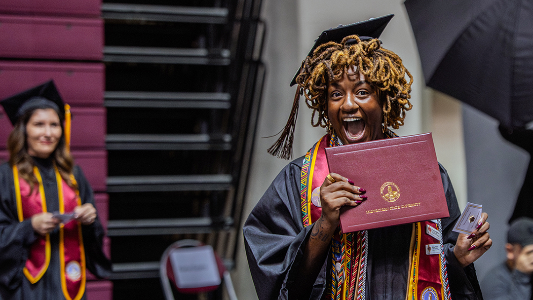 Graduate smiles in celebration