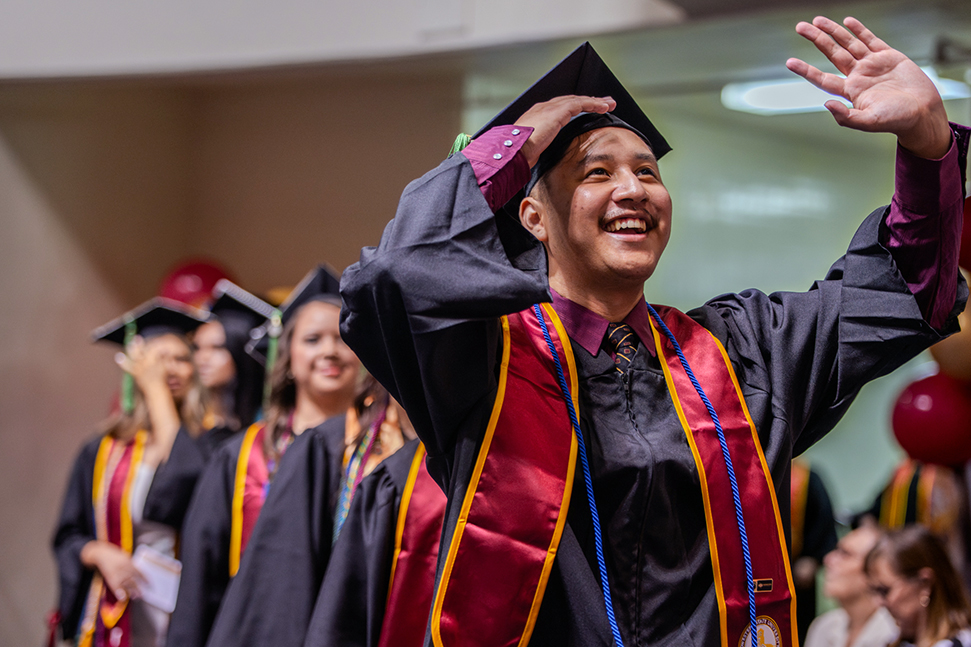 Graduate tips his cap at Spring 2026 Commencement