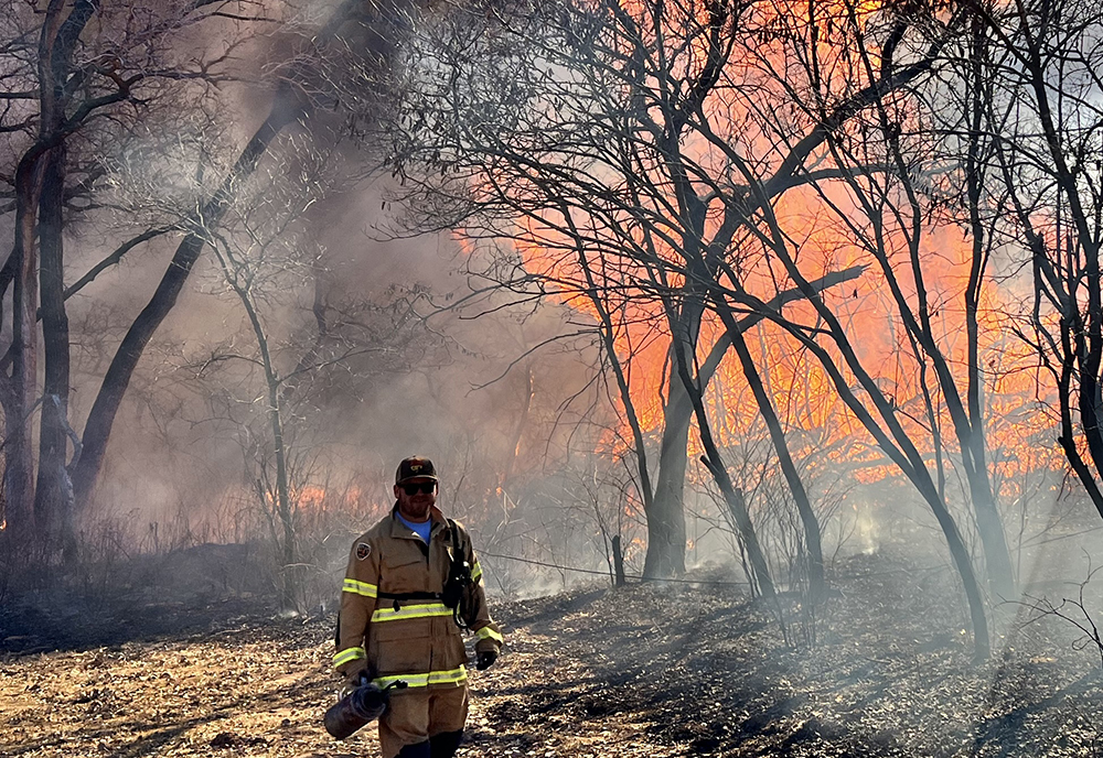 Marcus Thibodeau working a controlled burn in Oklahoma